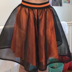 Poofy orange and black skirt
